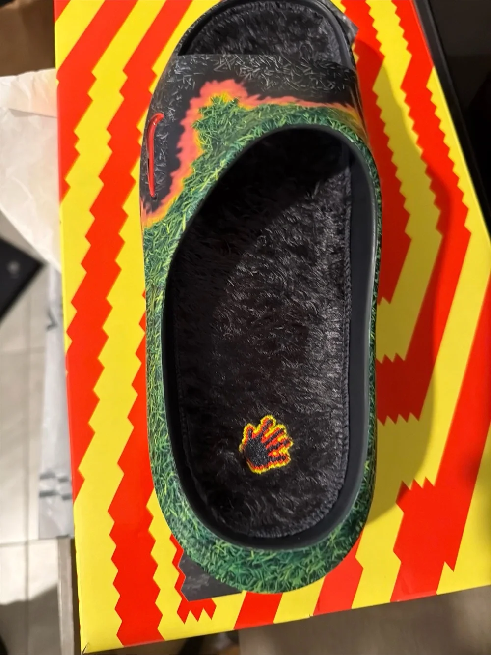 Nike Black Slides with Green Grass and Orange Flame Accents